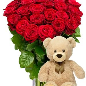 Bouquet of 50 red roses in a vase and a Teddy Bear