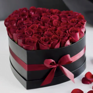 “Red Hearts” 50 red roses in a hat box (heart shape)