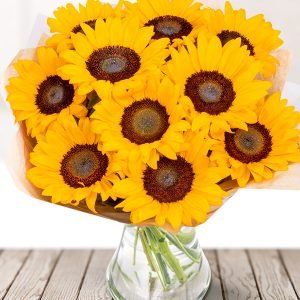 “Sunny Day” bouquet of 12 sunflowers in a vase