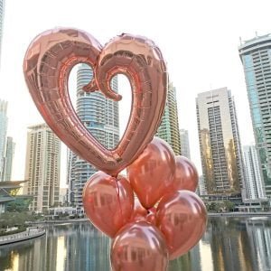 Set of 7 balloons (Heart 40″ and 6 latex balloons in Rose Gold color)